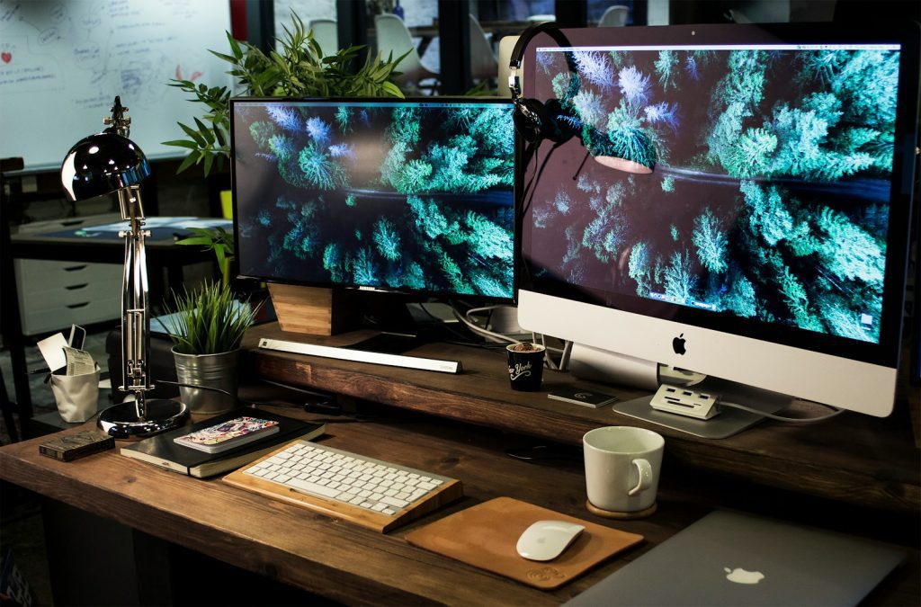 Why Black Shepherd Technologies is your best WordPress Partner in Kenya? 1 two computer monitors turned on with the same wallpaper