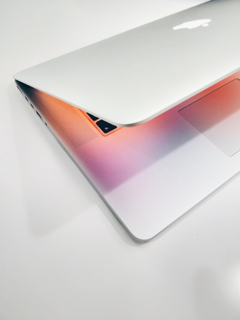 Conversion Rate Optimization (CRO) Services 1 Apple MacBook air on wooden surface
