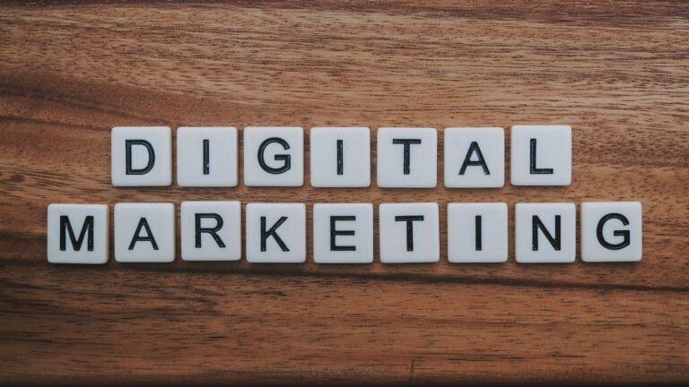 Digital Marketing Prices in Kenya for Every Service 4 digital marketing artwork on brown wooden surface