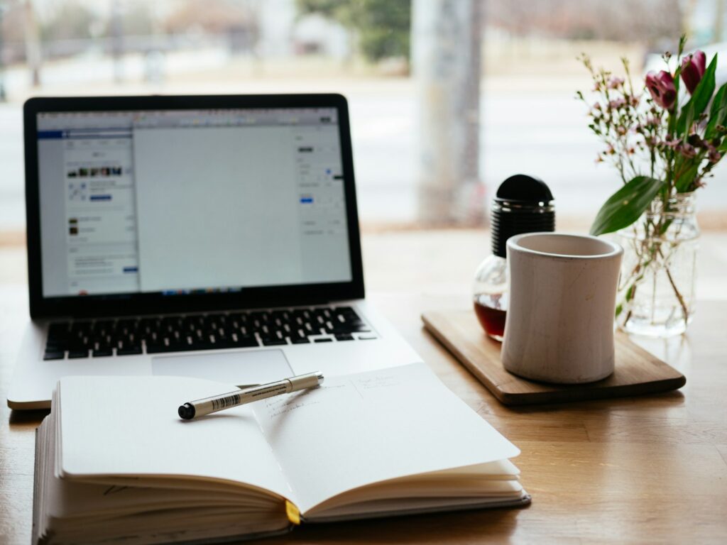 Content Management System (CMS) Development & Integration 1 MacBook Pro near white open book