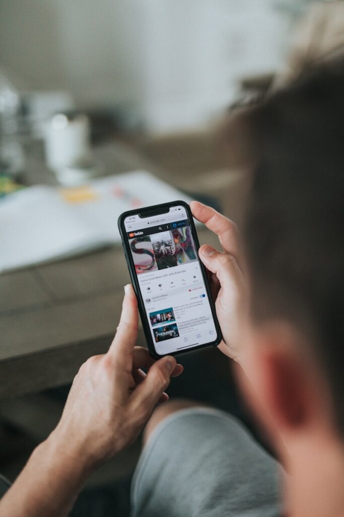 Using WhatsApp and TikTok to Sell More: Social Commerce Tips for Kenyan Entrepreneurs 2 person holding black iphone 4