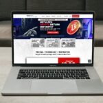 a laptop computer sitting on top of a table