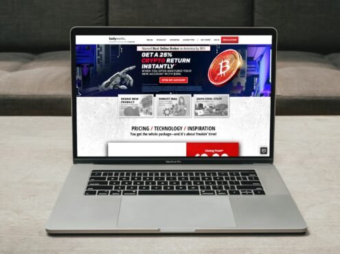 a laptop computer sitting on top of a table